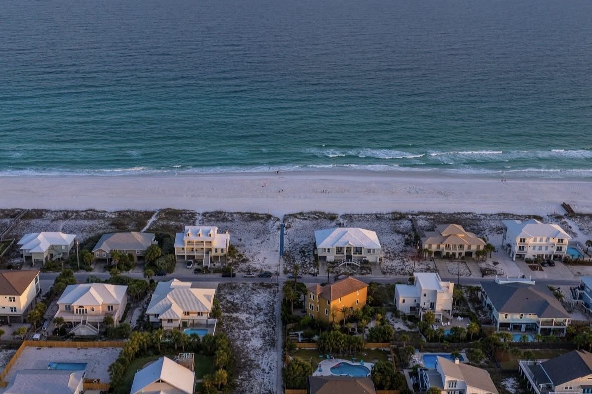 Homes along the beach at Pensacola Beach, with the Gulf beyond